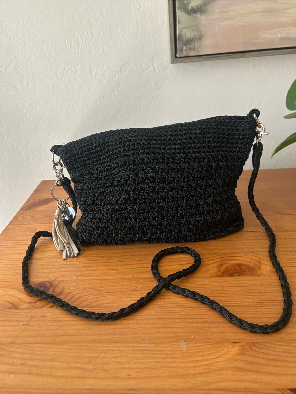 The Sak Black Crochet Crossbody with Tassel Charm
